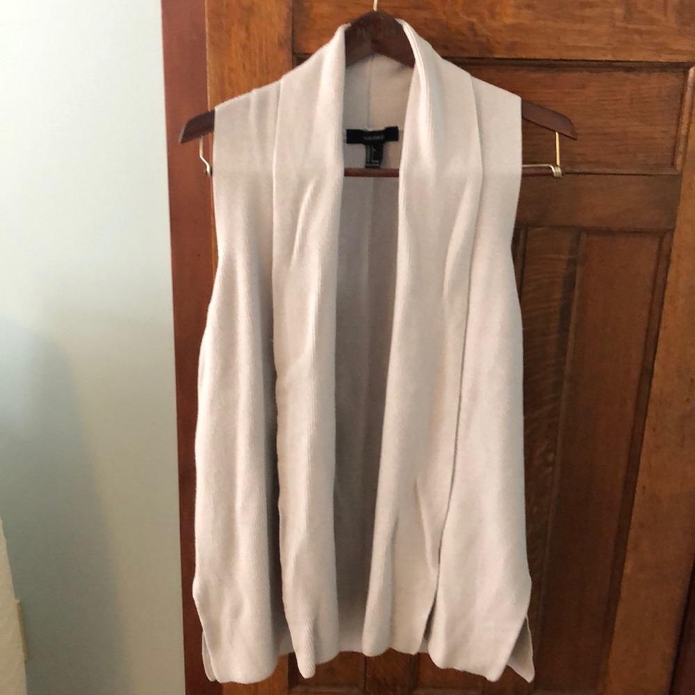 Sleeveless open front sweater